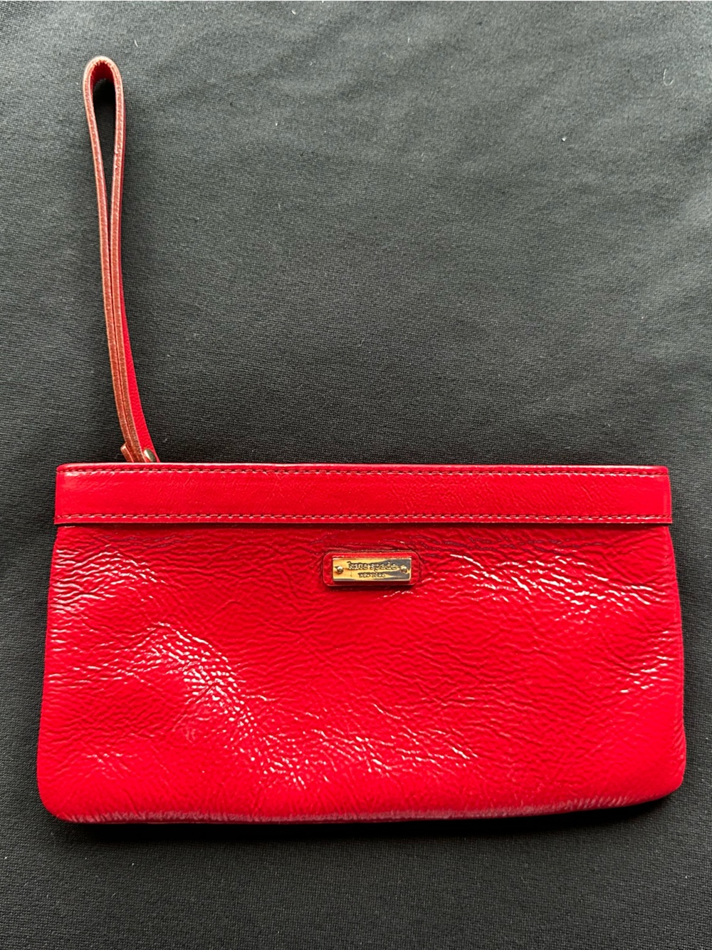 kate spade Red Leather Wristlet Clutch with Gold Logo